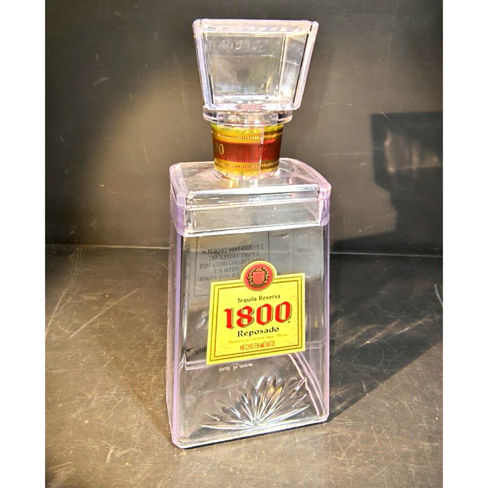 1763.  Empty Plastic Point of Sale Display Bottle 1800 Tequila Reposado